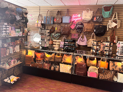 A wall of handbags and accessories inside the boutique